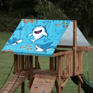 Custom swing set tarp featuring a happy shark character design n on wooden playset